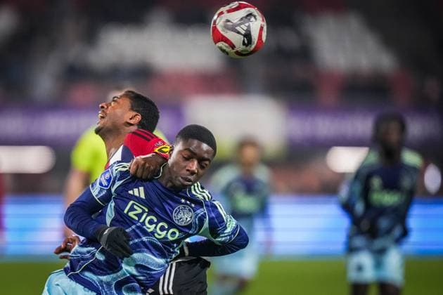 ROTTERDAM , 17-12-2025 , Sparta stadium ˜Het Kasteel™ , season 2025 2026 , Dutch KNVB Beker football , match between Excelsior Maasluis and Ajax , picture shows Excelsior Maassluis player Kevin Ringeling and Ajax player Pharrell Nash Excelsior Maassluis - Ajax (cup)  x200249152x Copyright: