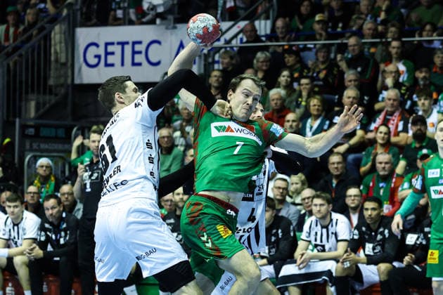Felix Claar SC Magdeburg,7 vs Hendrik Pekeler THW Kiel,61 Handball Bundesliga Season 2025 2026 SC Magdeburg vs THW Kiel at the GETEC Arena in Magdeburg Action,Handball,Germany,23 12 2025