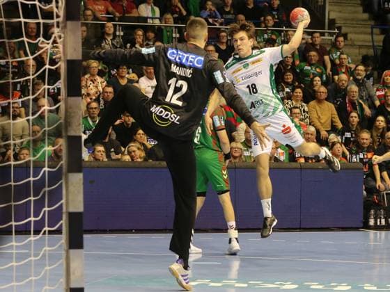 Goalkeeper Matej Mandic 12,SC Magdeburg and Staffan Peter 18,SCDHfK Leipzig Daikin HBL Season 2025 26 at 18 Matchday SC Magdeburg SC DHfK Leipzig 1135700150