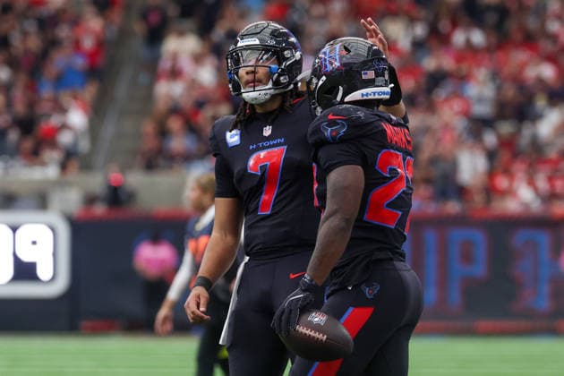HOUSTON, TX - OCTOBER 26: Quarterback C.J. Stroud 7 of the Houston Texans taps running back Woody Marks 27 of the Houston Texans on the helmet after a first down run during the NFL, American Football Herren, USA game between Houston Texans and San Francisco 49ers on October 26, 2025, at NRG Stadium in Houston, TX. (Photo by David Buono Icon Sportswire) NFL: OCT 26 49ers at Texans EDITORIAL USE ONLY Icon251026182