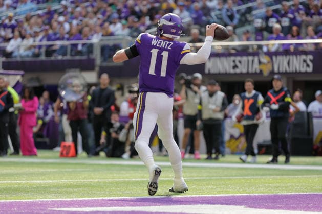 MINNEAPOLIS, MN - OCTOBER 19: Minnesota Vikings quarterback Carson Wentz (11) throws a pass that is intercepted during the first half of NFL, American Football Herren, USA game between the Minnesota Vikings and Philadelphia Eagles on October 19th, 2025, at U.S. Bank Stadium in Minneapolis, MN. (Photo by Bailey Hillesheim Icon Sportswire) NFL: OCT 19 Eagles at Vikings EDITORIAL USE ONLY Icon251019231