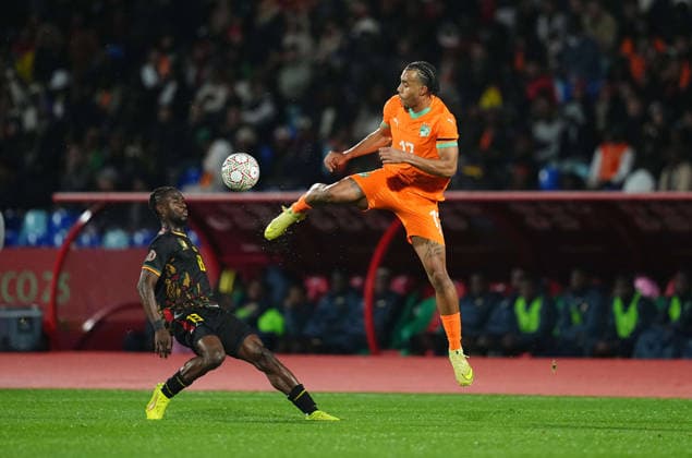 Jean Emile Junior Onana Onana Cameroon and GuÃ la Maho Lewis Doue CÃ te d Ivoire battle for the ball during the Africa Cup Of Nations match between Ivory Coast and Cameroon at Marrakesh Stadium on December 28, 2025 in Marrakech, Morocco Photo by Thor Wegner DeFodi Images