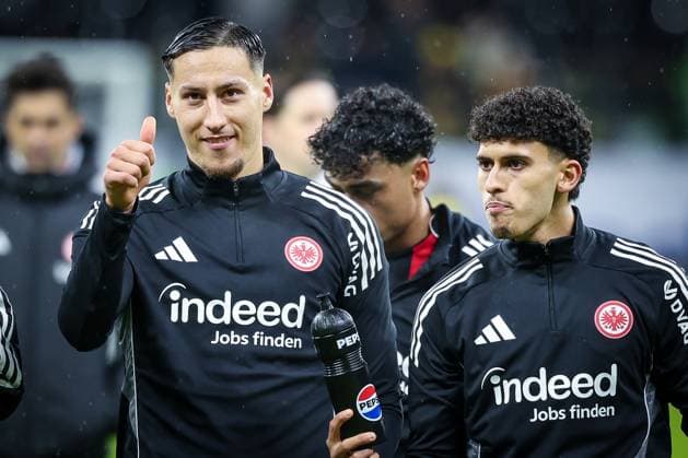 Younes Ebnoutalib 11 Eintracht Frankfurt satisfied, happy, with Ayoube Amaimouni 29 Eintracht Frankfurt , Eintracht Frankfurt vs Borussia Dortmund, Football, Men, Bundesliga, Season 2025 2026, Hinrunde, 16 Matchday, 09 01 2026 DFB regulations prohibit any use of photographs as image sequences and or quasi video Dortmund Hessen Germany Copyright: xkolbert-press MartinxAgüerax