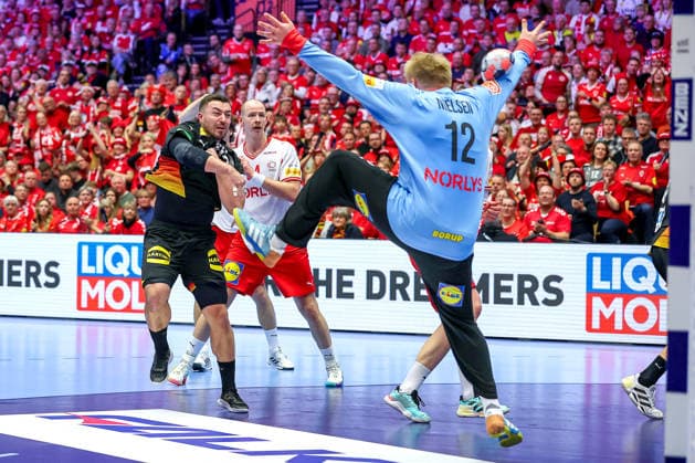 26 01 2026, Handball, Men s EHF EURO 2026, Germany Denmark, Jyske Bank Boxen in Herning, Denmark, Main Round Emil Nielsen Denmark 12 saves the throw of Jannik Kohlbacher Germany 80 Denmark