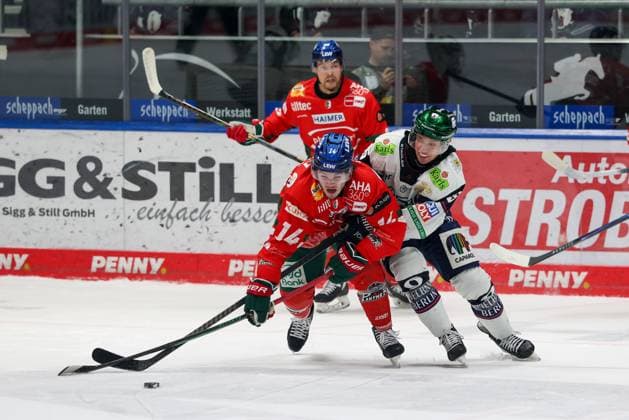 in duel, action, with D J Busdeker 14 Augsburger Panther , Frederik Tiffels 95 Eisbaeren Berlin , Augsburger Panther vs Eisbaeren Berlin, 44 Matchday, Ice Hockey, Penny DEL, 27 01 2026 Augsburg Bayern Germany Copyright: xkolbert-press ChristianxKolbertx