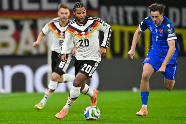 Leipzig, Red Bull Arena, 17 11 25, GER, Men, Qualification World Cup 2026, Germany Slovakia Picture from left in duel Serge GNABRY Germany and Leo SAUER Slovakia UEFA regulations prohibit any use of photographs as image sequences and or quasi video Saxony Germany