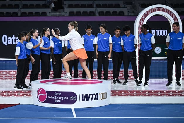 Qatar TotalEnergies Open 2026 Final, victory ceremony, winner Karolina Muchova CZE with ball kids Karolina Muchova CZE