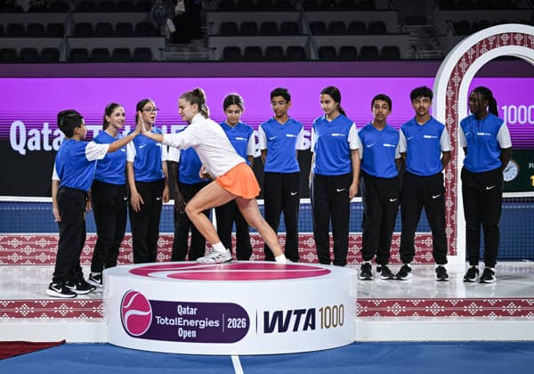 Qatar TotalEnergies Open 2026 Final, victory ceremony, winner Karolina Muchova CZE with ball kids Karolina Muchova CZE