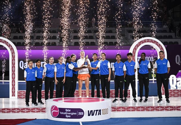 Qatar TotalEnergies Open 2026 Final, victory ceremony, winner Karolina Muchova CZE with ball kids Karolina Muchova CZE