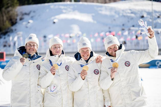 260215 Emil Iversen, Martin Lowstrom Nyenget, Einar Hedegart and Johannes Hosflot Klaebo of Norway celebrate on the podium after the men s 4 x 7 5km relay cross country skiing race during day 9 of the 2026 Winter Olympics on February 15, 2026 in Val di Fiemme Photo Maxim Thore BILDBYRAN kod MT MT0983 skidor cross country skiing langrenn olympic games olympics winter olympics os ol olympiska spel vinter os olympiske leker milano cortina 2026 milan cortina 2026 milano cortina 2026 olympic games milano cortina 2026 winter olympic games milano cortina os milano cortina ol vinter ol 9 bbeng herr stafett norge jubel  Copyright: MAXIMxTHORE BB260215MT094