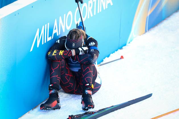 Antholz, Italy 15 February 2026 Biathlon Pursuit Women 12.5 km Olympic Games 2026 In the picture Franziska Preuss GER crouches disappointed in the finish area at the Anterselva Biathlon Arena railing Copyright: xFotostandx xHettichx