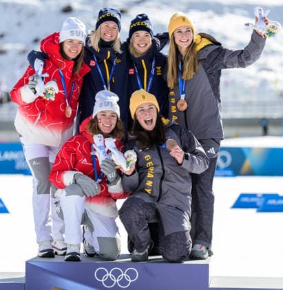 260218 Nadja Kälin and Nadine Faehndrich of Switzerland, Jonna Sundling and Maja Dahlqvist of Sweden and Laura Gimmler and Coletta Rydzek of Germany celebrate on the podium after the women s free technique team sprint cross country skiing final during day 12 of the 2026 Winter Olympics on February 18, 2026 in Val di Fiemme Photo Jon Olav Nesvold BILDBYRAN COP 217 MT0993 skidor cross country skiing langrenn olympic games olympics winter olympics os ol olympiska spel vinter os olympiske leker milano cortina 2026 milan cortina 2026 milano cortina 2026 olympic games milano cortina 2026 winter olympic games milano cortina os milano cortina ol vinter ol 12 bbeng teamsprint jubel sweden sverige  Copyright: JONxOLAVxNESVOLD BB260218JE078