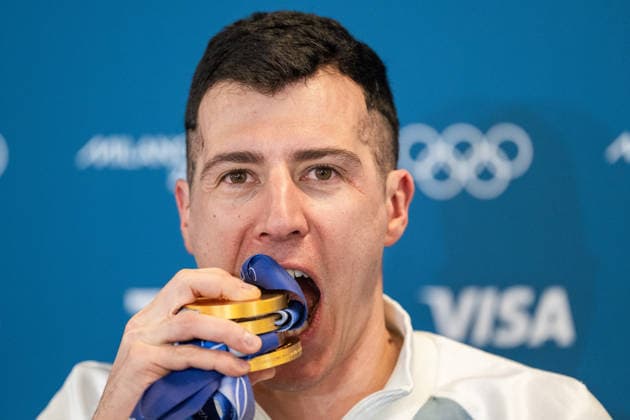 260220 Quentin Fillon Maillet of France takes a bite on his four medals at the press conference after men s biathlon 15 km mass start during day 14 of the 2026 Winter Olympics on February 20, 2026 in Anterselva Photo Mathias Bergeld BILDBYRAN code MB MB1339 biathlon biathlon olympic games olympics olympics winter olympics os ol olympiska spel vinter os olympiske leker milano cortina 2026 milan cortina 2026 milano cortina 2026 olympic games milano cortina 2026 winter olympic games milano cortina os milano cortina ol vinter ol 14 bbeng masstart mass start france  Copyright: MATHIASxBERGELD BB260220MB106