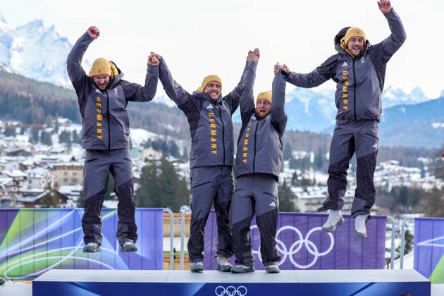 OLYMPICS - Winter Olympic Games, Olympische Spiele, Olympia, OS Milano Cortina 2026 CORTINA D AMPEZZO,ITALY,22.FEB.26 - OLYMPICS, BOBSLEIGH - Winter Olympic Games Milano Cortina 2026, 4-man, heat 3 and 4. Image shows the rejoicing of Johannes Lochner, Thorsten Margis, Jorn Wenzel and Georg Fleischhauer (GER). GEPAxpictures xMaticxKlansek