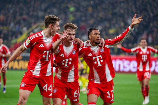 28 02 2026, Soccer, Borussia Dortmund FC Bayern München, 1 Soccer Bundesliga, 24 Matchday, Signal Iduna Park, Season 2025 2026 Goal celebration after the goal to 3 2 by scorer Joshua Kimmich FC Bayern Muenchen 06 together with Michael Olise FC Bayern Muenchen 17 and Josip Stanisic FC Bayern Muenchen 44 DFB regulations prohibit any use of photographs as image sequences and or quasi video Nordrhein Westfalen Germany