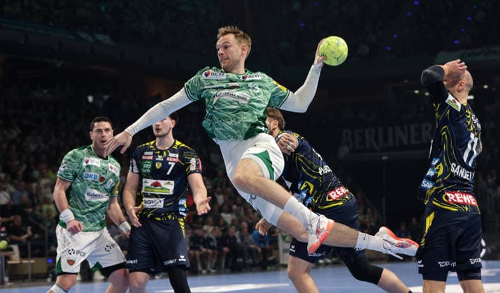 Mathias Gidsel scores a goal against goalkeeper David Späth duel Game scene Action Sport Handball HBL Bundesliga Men 23 Matchday Season 2025 2026 01 03 2026 Füchse Berlin vs Rhein Neckar Löwen RNL