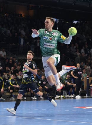 Mathias Gidsel scores a goal against goalkeeper David Späth duel Game scene Action Sport Handball HBL Bundesliga Men 23 Matchday Season 2025 2026 01 03 2026 Füchse Berlin vs Rhein Neckar Löwen RNL