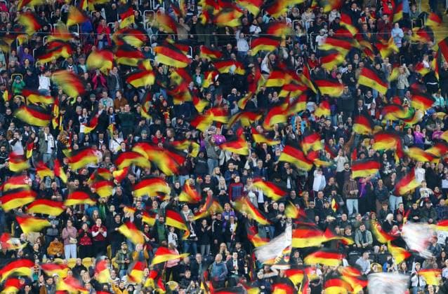 GER, Football, Women, World Cup Qualification, Germany Slovenia 03 03 2026, Dresden, Rudolf Harbig Stadium, GER, World Cup Qualification, Women Country Match, Group Phase, Group D, Match 1 of 6 Germany Slovenia in picture Fans waving Germany flags, a sea in black red gold DFL regulations prohibit any use of photographs as image sequences and or quasi video