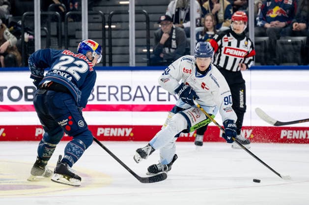 Fight for the puck duel between Ville Pokka EHC Red Bull Muenchen, 22 and Filip Varejcka Straubing Tigers, 90 GER, EHC Red Bull Muenchen vs Straubing Tigers, Ice Hockey, DEL, Matchday 51, Season 2025 2026, 13 03 2026 GER, EHC Red Bull Muenchen vs Straubing Tigers, Ice Hockey, DEL, Matchday 51, Season 2025 2026, 13 03 2026 Muenchen Copyright: xEibner-Pressefoto FranzxFeinerx EP_HFR