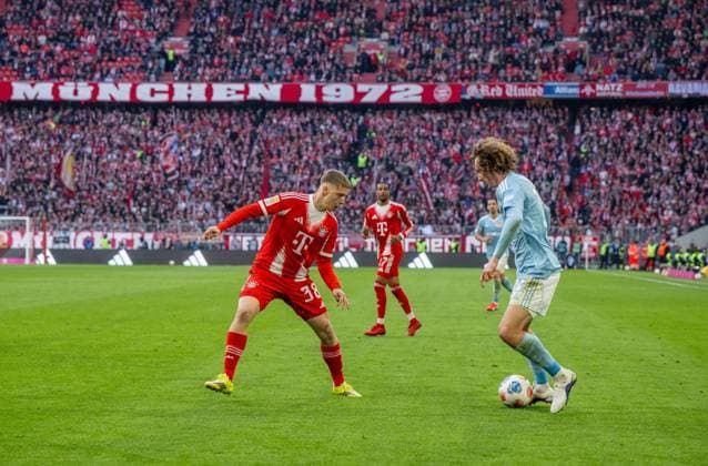 Soccer, Men, Season 2025 2026, 1 Bundesliga 27 Matchday , FC Bayern Munich 1 FC Union Berlin, v l Erblin Osmani Bayern Munich , Alex Kral 1 FC Union Berlin , 21 03 2026, Copyright: xMatthiasxKochx
