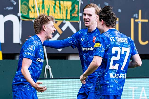 Kristian Hlynsson of FC Twente celebrates with Mats Rots of FC Twente and Sondre Orjasaeter of FC Twente after scoring his teams second goal Fortuna Sittard v FC Twente, Eredivisie, Fortuna Sittard v FC Twente 65, Fortuna Sittard Stadion, March 21, 2026, Sittard, Netherlands.