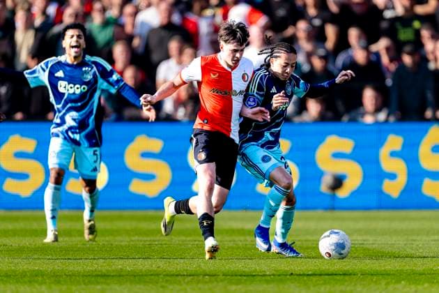 ROTTERDAM AFC Ajax Amsterdam player Kian Fitz Jim, SC Feyenoord Rotterdam player Leo Sauer during the Dutch Vriendenloterij Eredivisie match between Feyenoord and Ajax at De Kuip on March 22, 2026 in Rotterdam, the Netherlands Photo by DeFodi Images