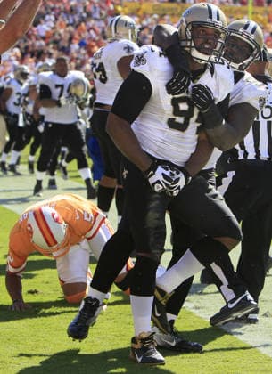 Oct. 21, 2012 - Tampa, FL, USA - Tampa Bay Buccaneers quarterback Josh Freeman (5) remains down after he is stopped by New Orleans Saints defensive end Cameron Jordan (94) at Raymond James Stadium in Tampa, Florida on Sunday, October 21, 2012. The New Orleans Saints defeated the Tampa Bay Buccaneers, 35-28. Copyright: xDirkxShaddx