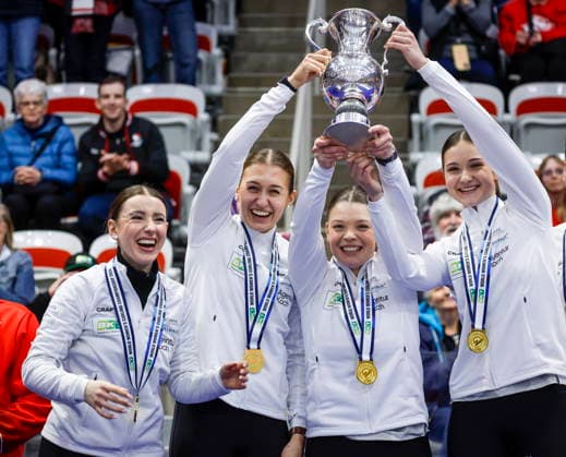March 22, 2026, Calgary, Ab, CANADA: Switzerland skip Xenia Schwaller, left to right, third Selina Gafner, vice-skip Fabienne Rieder and lead Selina Rychiger raise the trophy after defeating Canada to win the World WomenöÄÃ s Curling Championship in Calgary, Sunday, March 22, 2026. Selina Rychiger, Fabienne Rieder, Selina Gafner, Xenia Schwaller - ZUMAc35_ 20260322_zaf_c35_039 Copyright: xJeffxMcintoshx