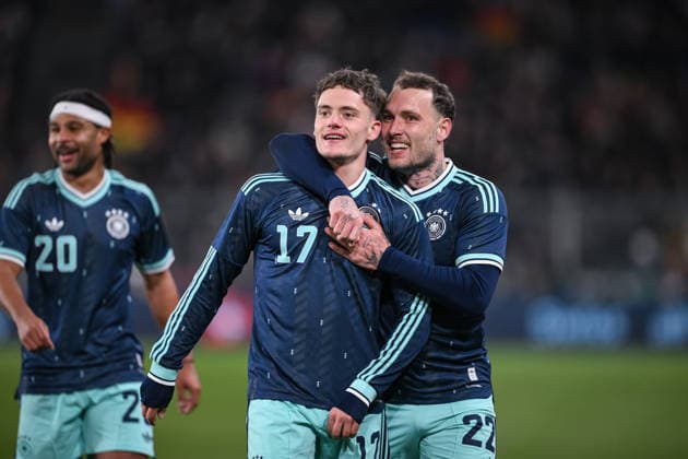Football International Test match World Cup 2026 in Basel Switzerland Germany 27 03 2026 CHEERS Germany two-goal scorer Florian Wirtz center is hugged by David Raum right after his goal for 2 3
