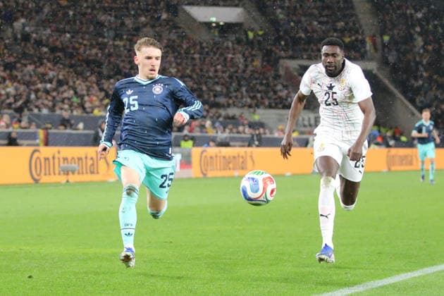 30 03 2026 Soccer Men 2025 2026 International match Germany Ghana MHPArena Stuttgart Lennart Karl Germany, 25, blue in a running duel with Derrick Luckassen Ghana, 25, white Stuttgart Baden Württemberg Germany