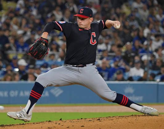 Cleveland Guardians starting pitcher Parker Messick winds up tp deliver against the Los Angeles Dodgers at Dodger Stadium in Los Angeles on Monday, March 30, 2026.  LAP20260330801 JIMxRUYMEN