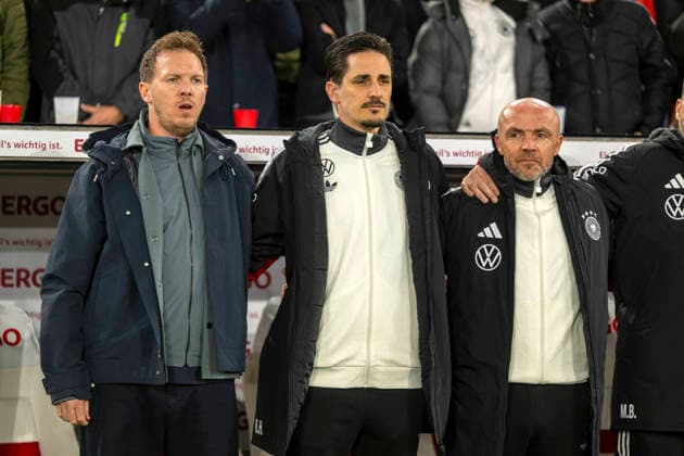 30 03 2026, Football friendly international 2 match day, Germany Ghana, at the MHP Arena Stuttgart Germany During the anthem, from left coach Julian Nagelsmann Germany , co-coach Benjamin Hübner Germany , co-coach Alfred Schreuder Germany ,