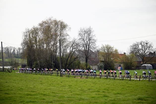 The pack of riders pictured in action during the men elite race of the Dwars Door Vlaanderen cycling event, 184,6km from Roeselare to Waregem, Wednesday 01 April 2026. POOLxTOMASxSISK  x169505021x