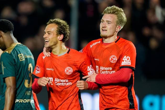 ALMERE , 03-04-2026 , Yanmar stadium , season 2025 2026 , Dutch Keuken Kampioen Divisie football , match between Almere City and TOP Oss , Picture shows Almere City FC player Olivier de Nijs and Almere City FC player Julian Rijkhoff celebrating the 3-1 Almere City - TOP Oss  x202819200x Copyright: