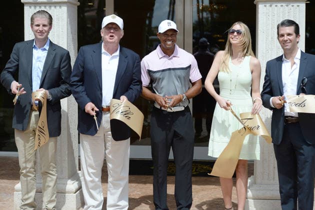 DORAL, FL - MARCH 05: Eric Trump, Donald Trump, Tiger Woods, Ivanka Trump and Donald Trump Jr. cut a ribbon in front of the Tiger Woods Villa prior to the start of the World Golf Championships-Cadillac Championship at Trump National Doral on March 5, 2014 in Doral, Florida....People: Eric Trump; Donald Trump; Tiger Woods; Ivanka Trump; Donald Trump Jr. Copyright: xSMGx