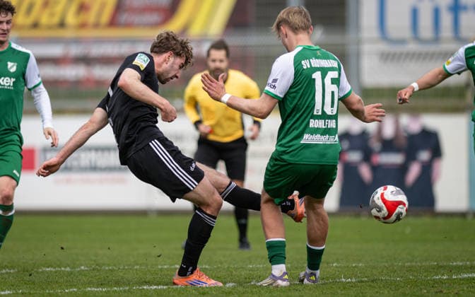 Soccer, Season 2025 2026, Regionalliga West, 11 04 2026, Matchday 29, Men, 1 FC Bocholt black vs SV Roedinghausen green v l Maximilian Adamski 1 FC Bocholt , Mattis Rohfing SV Roedinghausen , Bocholt Stadion am Huenting Nordrhein Westfalen Germany 260411_fb_1fc-bocholt_sv-roedinghausen_50898