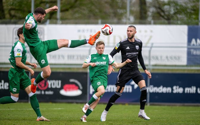 Soccer, Season 2025 2026, Regionalliga West, 11 04 2026, Matchday 29, Men, 1 FC Bocholt black vs SV Roedinghausen green v l Maximilian Hippe SV Roedinghausen , Viktor Miftaraj SV Roedinghausen , Manuel Reutter SV Roedinghausen , Dominik Lanius 1 FC Bocholt , Bocholt Stadion am Huenting Nordrhein Westfalen Germany 260411_fb_1fc-bocholt_sv-roedinghausen_50899
