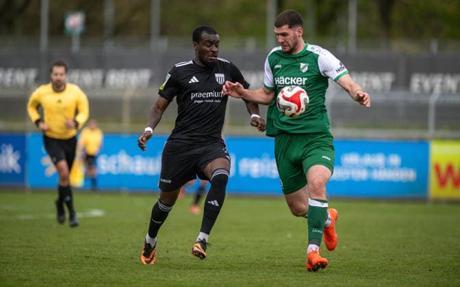 Soccer, Season 2025 2026, Regionalliga West, 11 04 2026, Matchday 29, Men, 1 FC Bocholt black vs SV Roedinghausen green v l Jesaja Herrmann 1 FC Bocholt , Viktor Miftaraj SV Roedinghausen , Bocholt Stadion am Huenting Nordrhein Westfalen Germany 260411_fb_1fc-bocholt_sv-roedinghausen_50914
