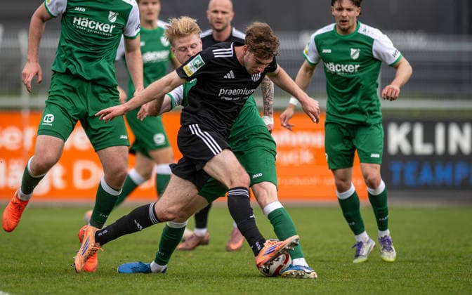 Soccer, Season 2025 2026, Regionalliga West, 11 04 2026, Matchday 29, Men, 1 FC Bocholt black vs SV Roedinghausen green v l Tim Corsten SV Roedinghausen , Maximilian Adamski 1 FC Bocholt , Bocholt Stadion am Huenting Nordrhein Westfalen Germany 260411_fb_1fc-bocholt_sv-roedinghausen_50919