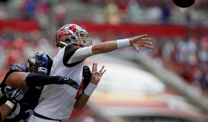 Oct. 12, 2014 - Tampa, FL, USA - Tampa Bay Buccaneers quarterback Mike Glennon (8) is hurried by Baltimore Ravens nose tackle Haloti Ngata (92) as he releases for an incomplete pass, bringing up a fourth down, at the beginning of the second quarter on Sunday, Oct. 12, 2014, at Raymond James Stadium in Tampa, Fla. Copyright: xDirkxShaddx