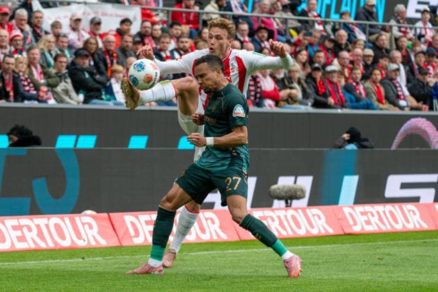 Duel between Sebastian Sebulonsen 1 FC Koeln, 28 and Felix Agu SV Werder Bremen, 27 1 FC Koeln vs SV Werder Bremen, Football, 1 Bundesliga, 29 Matchday, Season 2025 2026, 12 04 2026 DFL DFB Regulations prohibit any use of Photographs as image sequences and or Quasivideo 1, FC Koeln vs SV Werder Bremen, Football, 1 Bundesliga, 29 Matchday, Season 2025 2026, 12 04 2026 Koeln Copyright: xEibner-Pressefoto ThomasxHaeslerx EP_THR