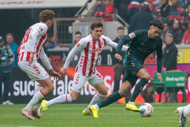 Duel between Sebastian Sebulonsen 1 FC Koeln, 28 , Alession Castro Montes 1 FC Koeln, 17 and Justin Njinmah SV Werder Bremen, 11 1 FC Koeln vs SV Werder Bremen, Football, 1 Bundesliga, Matchday 29, Season 2025 2026, 12 04 2026 DFL DFB Regulations prohibit any use of Photographs as image sequences and or Quasivideo 1, FC Koeln vs SV Werder Bremen, Football, 1 Bundesliga, Matchday 29, Season 2025 2026, 12 04 2026 Koeln Copyright: xEibner-Pressefoto ThomasxHaeslerx EP_THR