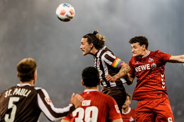 Germany Soccer Bundesliga 2025 26, 30 Matchday FC St Pauli vs 1 FC Köln Koeln Millerntor Stadion Hamburg Header duel Jackson Irvine FC St Pauli, 7 with Eric Martel 1 FC Köln Koeln, 6 Copyright: xStefanxTrochax