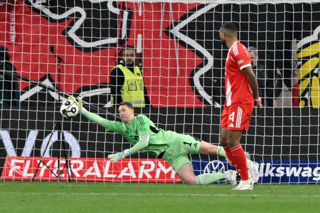 Goalkeeper Manuel Neuer Bayern Muenchen saves Nathan Tellas shot Bayer 04 Leverkusen 22 04 2026, Football DFB Pokal, 2025 2026, Semifinal, Bayer 04 Leverkusen FC Bayern München 0 2 DFB regulations prohibit any use of photographs as image sequences and or quasi video Leverkusen BayArena Nordrhein Westfalen Germany Team2