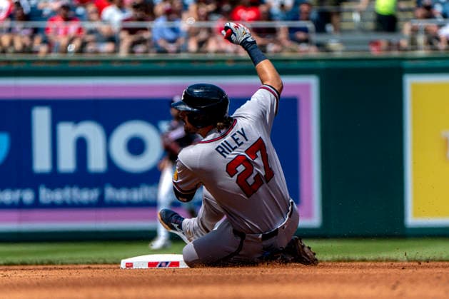 Atlanta Braves third baseman Austin Riley (27) slides into second base in the top of the fourth inning during a game against the Washington Nationals at Nationals Park in Washington, DC on Thursday, April 23, 2026.  WAP20260423317 BONNIExCASH