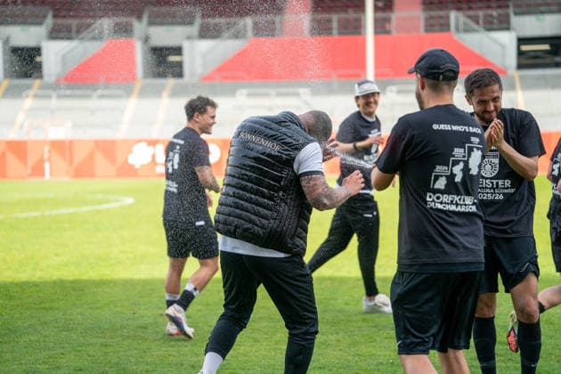02 05 2026, xdaymx, Soccer Regionalliga Suedwest, FSV Mainz 05 U23 SG Sonnenhof Grossaspach Head Coach Pascal Reinhardt SG Sonnenhof Grossaspach receives a champagne shower after the promotion at the U23 in Mainz DFL DFB REGULATIONS PROHIBIT ANY USE OF PHOTOGRAPHS as IMAGE SEQUENCES and or QUASI VIDEO Mainz