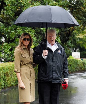 September 2, 2017 - Washington, District of Columbia, U.S. - United States President Donald J. Trump and first lady Melania Trump look towards the press pool prior to their Marine One departure from the White House. The President and first lady are traveling to Texas to visit individuals impacted by Hurricane Harvey. Copyright: xOlivierxDoulieryx