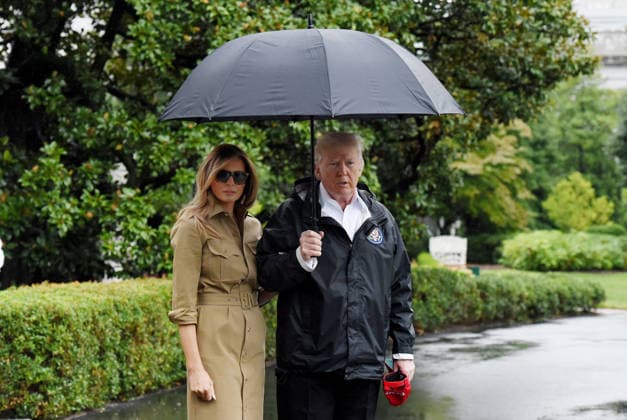 September 2, 2017 - Washington, District of Columbia, United States of America - United States President Donald J. Trump and first lady Melania Trump look towards the press pool prior to their Marine One departure from the White House September 2, 2017 in Washington, DC. The President and first lady are traveling to Texas to visit individuals impacted by Hurricane Harvey. .Credit: Olivier Douliery Pool via CNP Copyright: xOlivierxDoulieryx