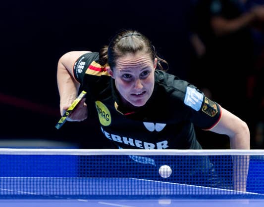 Sabine Winter, Germany, TSV Dachau, in the round of 32 against Malaysia at the World Team Table Tennis Championships in London at the OVO Arena Wembley Sabine Winter, Germany, TSV Dachau, World Cup third and Europe Top 16 winner, on May 4 at the OVO Arena Wembley at the World Team Table Tennis Championships in London in the final round of the round of 32 against Malaysia against Karen Lyne London OVO Arena Wembley London England