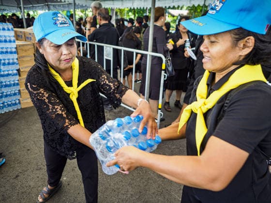 September 27, 2017 - Bangkok, Bangkok, Thailand - Volunteers stack bottles of water to be handed out to mourners at the Grand Palace in Bangkok. Bhumibol Adulyadej, the Late King of Thailand, died on October 13, 2016. Thailand has been in a state of mourning since. He will be cremated on October 26, 2017. Thais have been going to the Grand Palace to pay respects to the revered King. The Thai government has announced that the palace will close to the public on October 4, 2017, to prepare for the Monarch s funeral. Since the announcement, tens of thousands of Thais have lined up at the palace every day to pay their final respects. Copyright: xSeanxEdisonx
